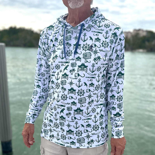 Older man standing on a dock in Florida wearing the Six Knots Pirate's Life Performance Hoodie — lightweight, moisture-wicking fishing hoodie featuring an all-over nautical pirate pattern with treasure chests, skull and crossbones, cannons, hooks, and maritime icons