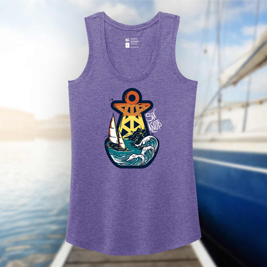 Purple Six Knots Tropical Storm Women's Tank Top photographed against a blurred marina backdrop. This ultra-soft, lightweight women's tank is made from a breathable cotton-polyester blend and showcases a bold Six Knots buoy logo featuring a sailboat battling stormy waves. Designed for comfort and style, it's perfect for beach days, summer getaways, boating trips, casual coastal wear, and laid-back waterfront living.